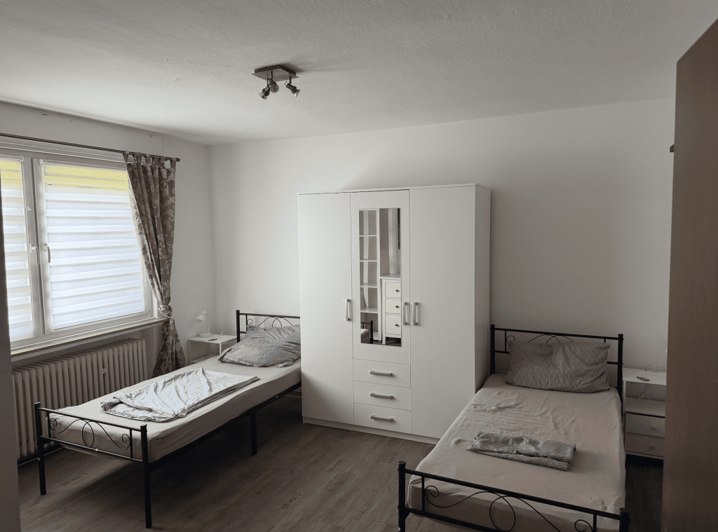Doppelzimmer im Erdgeschoss mit gemeinsamem Garten in Meppen